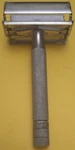 Gillette Safety Razor Vintage Britain Patent 694093 Twist Open Silver Tone. Fixed Price $26.00.