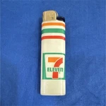 7-ELEVEN Disposable Lighter White Green Orange Red Collectible. Fixed Price $18.00.