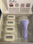 Schick Intuition Razors Bundle, 1 And 4 Refills New. Fixed Price $30.99.