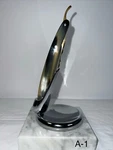 Straight Razor 5/8 Bergischer We Horn Handle, Gold Platted Spine, Hollowground. Fixed Price $279.98.