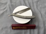 Marbles 100TH Anniversary Straight Razor. Fixed Price $40.00.