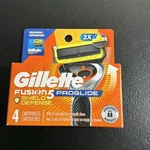 Gillette Fusion 5 Proglide Shield Defense 4 Refill Cartridges. Fixed Price $9.99.