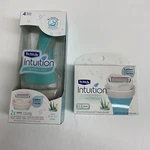 New Schick Intuition Naturals Aloe Sensitive Care 1 Razor Handle + 5 Cartridges. Fixed Price $21.99.