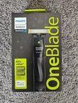 Philips Norelco Oneblade Razor Trimmer, Edge, Shave 1 Blade- 2 Combs Wet/dry. Fixed Price $15.99.