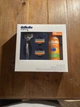 Gillette Fusion 5 Gift Set 1 Razor 2 Cartridges And Sensitive Shave Gel. Fixed Price $23.00.