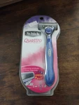 Womens Schick Quattro Razor With 2 Cartridges And Shower Hanger. Fixed Price $6.99.