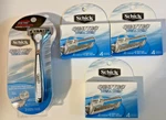 Schick Quattro Titanium Razor With 3 Packs Of Cartridges - Total 14. Fixed Price $22.99.
