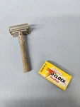 Gillette Slim Adjustable Vintage Safety Razor W/ 4 7 Oclock Blades. Fixed Price $35.00.