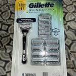 Gillette Skinguard Razor With Aloe Sensitive W/ 13 Refill Cartridges Blade. Fixed Price $32.98.