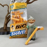 Orange Bic Shavers Vintage 1991 Mens Sensitive Skin Open Package With Razors. Fixed Price $12.99.