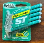 2003 Schick St Slim Twin Sensitive Vitamin Non Slip Disposable Razors 5 Ct Pk. Fixed Price $14.71.