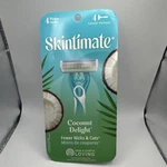 Skintimate Coconut Delight 4 Blade Women's Cartridge Razor Scented Moisturizing. Fixed Price $10.80.