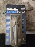 Vintage 1993 Gillette Sensor Excel Metal Razor With 2 Blades Nos. Fixed Price $86.00.