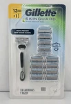 Gillette Skinguard Razor With Aloe Sensitive + 13 Refill Cartridges Blade. Fixed Price $34.99.