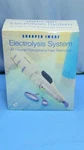 Sealed Sharper Image Cordless E-pen Face Electrolysis System Facial Hair Remover. Fixed Price $74.99.