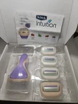 Schick Intuition Razors Bundle, 1 And 4 Refills New Variety Pack. Fixed Price $22.85.