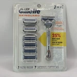 New! Gillette Skinguard Men's Razor Handle + 7 Cartridges. Fixed Price $24.95.