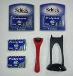 Schick Protector - 4 New Packs Of Blades (20 Total) Handle W/ Stand. Fixed Price $57.99.