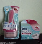 Schick Intuition Women's Razor + 6 Refill Cartridges. Renewing Moisture. Nib. Fixed Price $39.99.