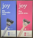 2PK Gillette Joy The Pink+lavender One Razor HANDLES/4 Cartridges Total Sealed. Fixed Price $12.99.