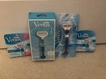 Gillette Venus Womens Razor Handle, (2) With 14 Total Refill Cartridges. Fixed Price $36.00.