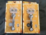 2 Gillette Venus Moistureglide W/ Touch Of Argan Oil Cartridges Metal Handle. Fixed Price $28.08.