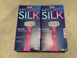 2 Brand New Schick Hydro Silk Moisture Razor & 4 Refill Cartridges. Fixed Price $14.56.