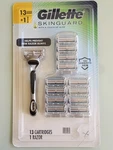 Gillette Skinguard Razor With Aloe Sensitive + 13 Refill Cartridges Blade. Fixed Price $34.00.