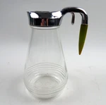 Vintage Hazel Atlas Glass 9" Syrup Pitcher Green Androck Bullet Bakelite Handle. Fixed Price $44.95.