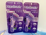 8 Pcs Skintimate Quattro 4-BLADE Disposable Razors, Exotic Violet Blooms. Fixed Price $9.00.