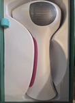 Tria Laser Hair Removal Device White/pink. Fixed Price $275.00.