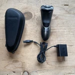 Philips Norelco Aquatec Electric Shaver With Charger And Case. Fixed Price $14.99.