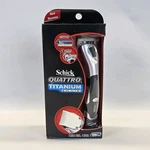 Schick Quattro Titanium Razor With Trimmer New Old Stock. Fixed Price $31.00.