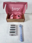 Joy Razors For Women, 1 Handle, 4 Blade Refills, Lavender. Fixed Price $9.99.