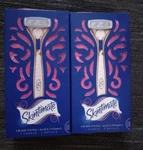 2 Packs Skintimate Razor, 4 Blades System With Aloe & Vit. Fixed Price $20.00.