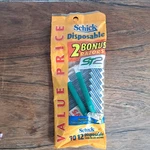 Schick ST2 Slim Twin Blade Disposable Razors, 12 Pack Nos Built-in Safety Cap. Fixed Price $15.98.