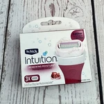 Schick Intuition Renewing Moisture Razor Blade Refills With Pomegranate Extract. Fixed Price $12.99.
