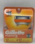 Gillette Fusion 5 Refill Cartridges 12 Count Ripped Back As Pictured. Fixed Price $29.99.