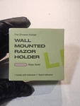 The Leaf Razor Shower Holder New In Box Rose Gold. Fixed Price $30.00.