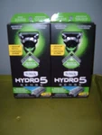 2 New Men's Schick Hydro 5 Sense Sensitive Razor Flip Back Trimmer 6 Cartridges. Fixed Price $32.95.